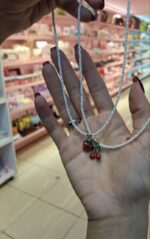 گردنبند مرواریدی با پلاک میوه ای